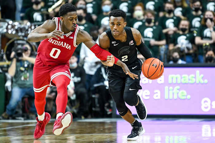 Michigan State's Tyson Walker, right, takes off after a steal as Indiana's Xavier Johnson defends during the second half on Saturday, Feb. 12, 2022, at the Breslin Center in East Lansing.